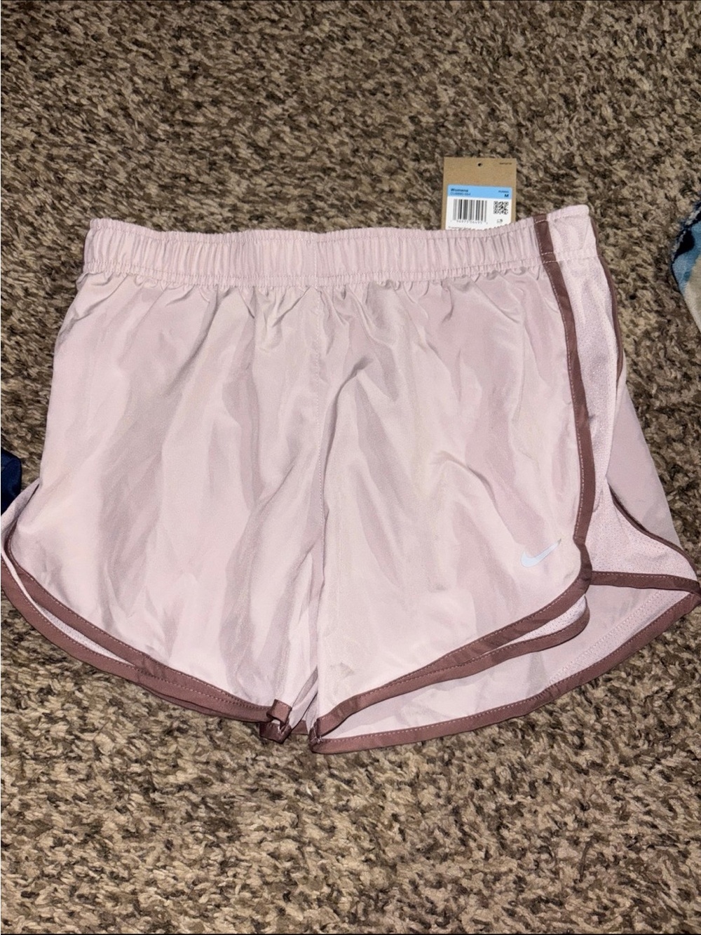 Nike Women’s Light Pink Athletic Shorts with Mauve Trim